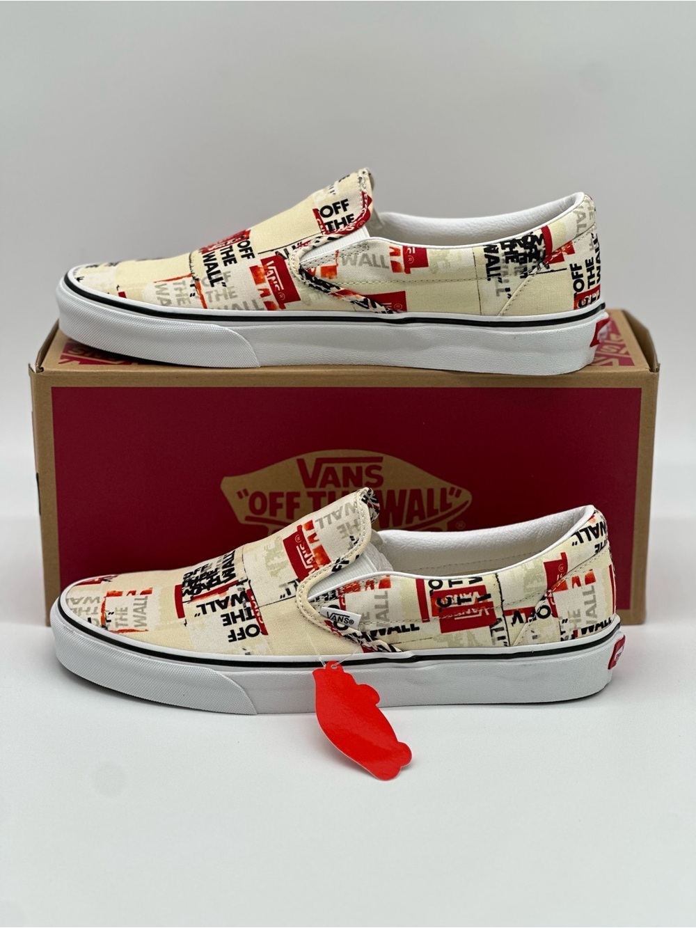 Vans Slip-On Sneakers in Cream, Red & Black Graphic Print